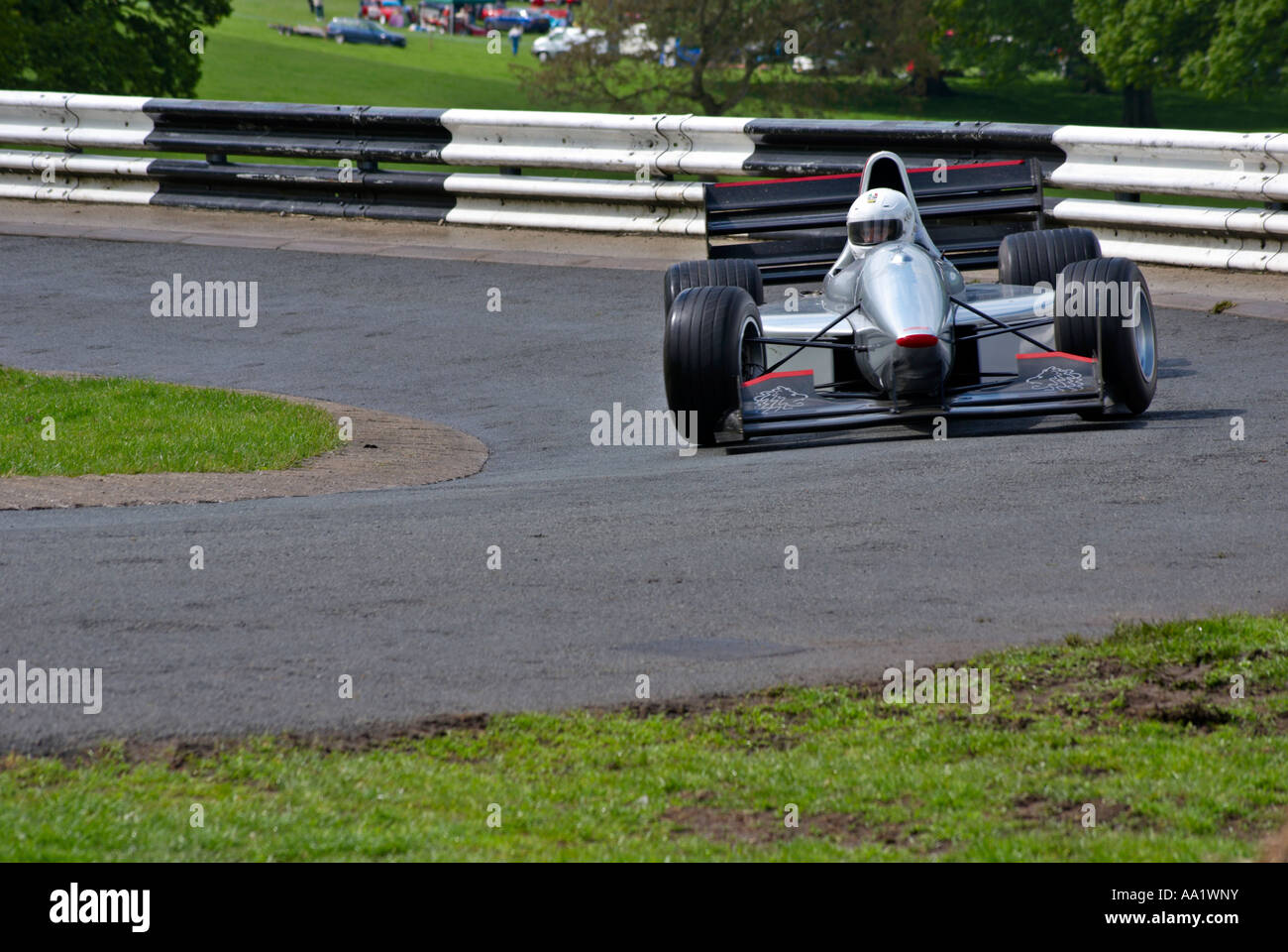 Racing Car A performance racing car negotiating a tight bend at a motor
