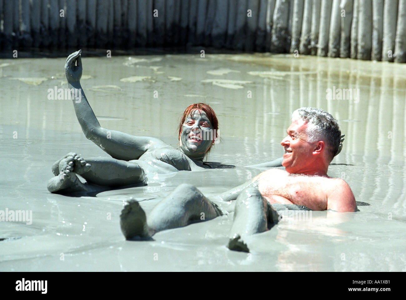 Tourists enjoy the Mud Baths at Dalyan in Turkey Stock Photo