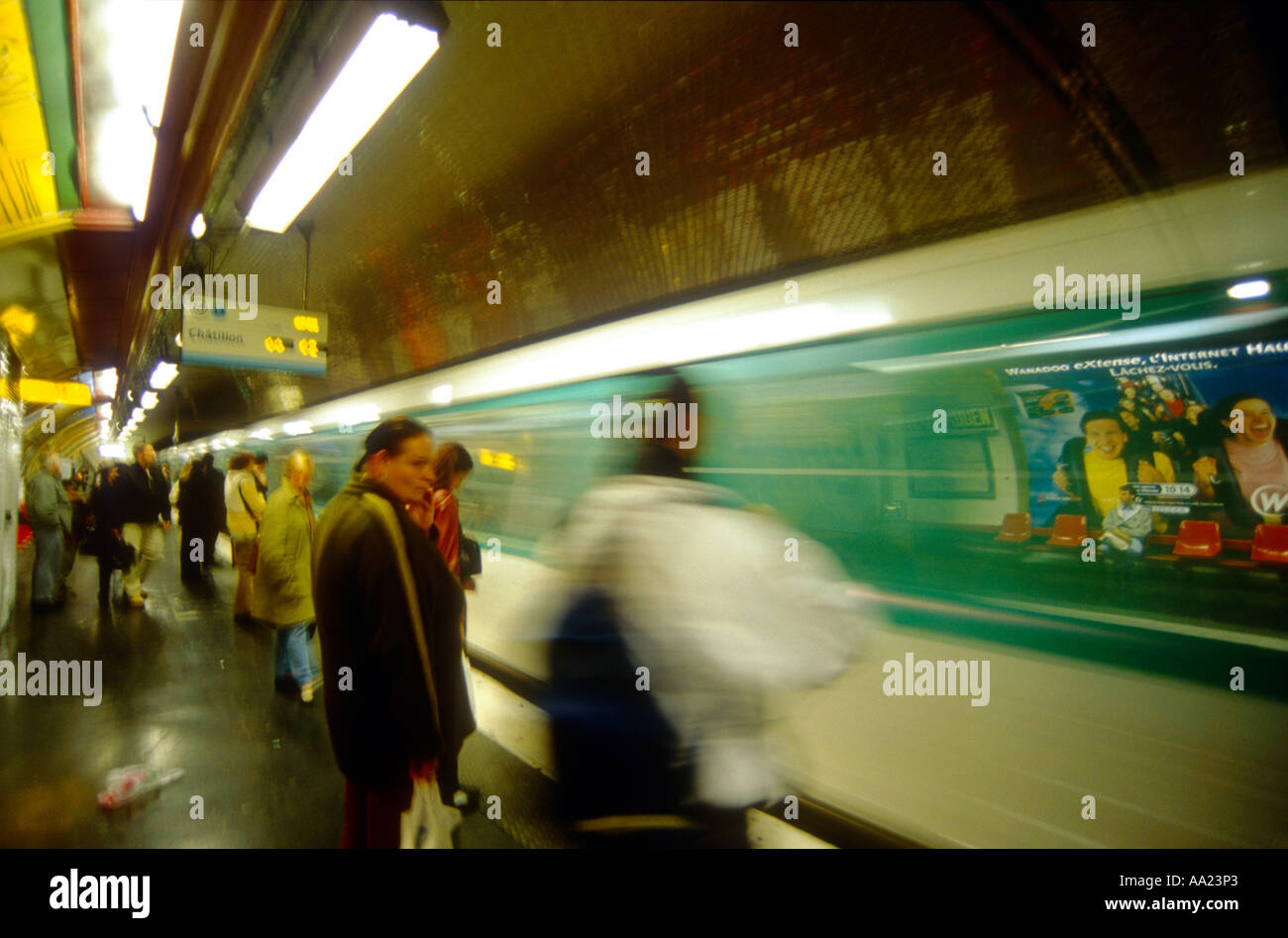 France, Paris, people on metro platform, blurred  motion Stock Photo