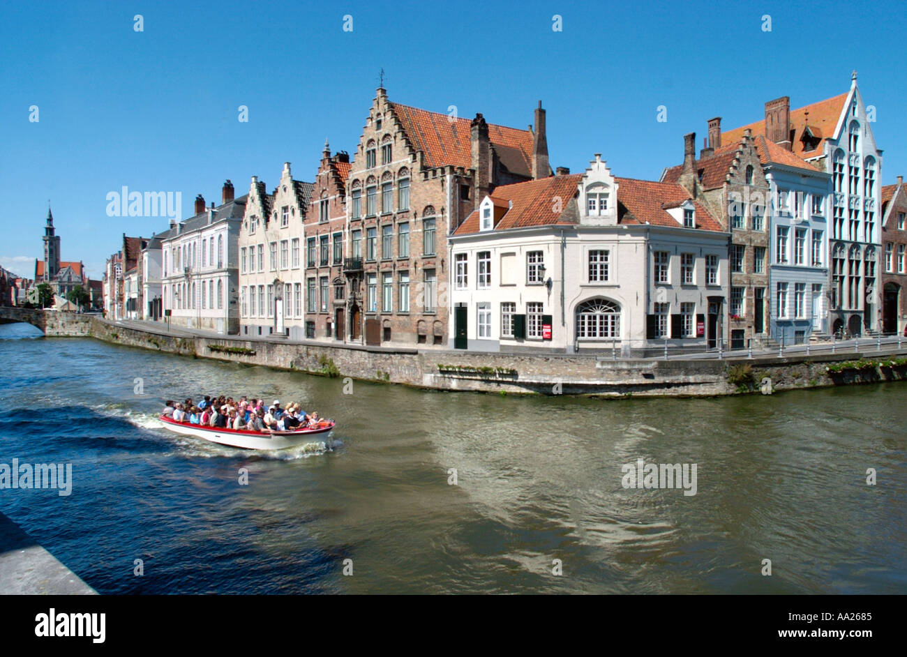 Boat trip on a canal in the old city centre, Bruges, Belgium Stock Photo