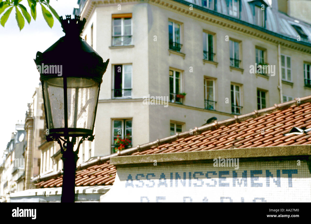 France, Paris, street lamp and buildings, close-up, high section Stock Photo