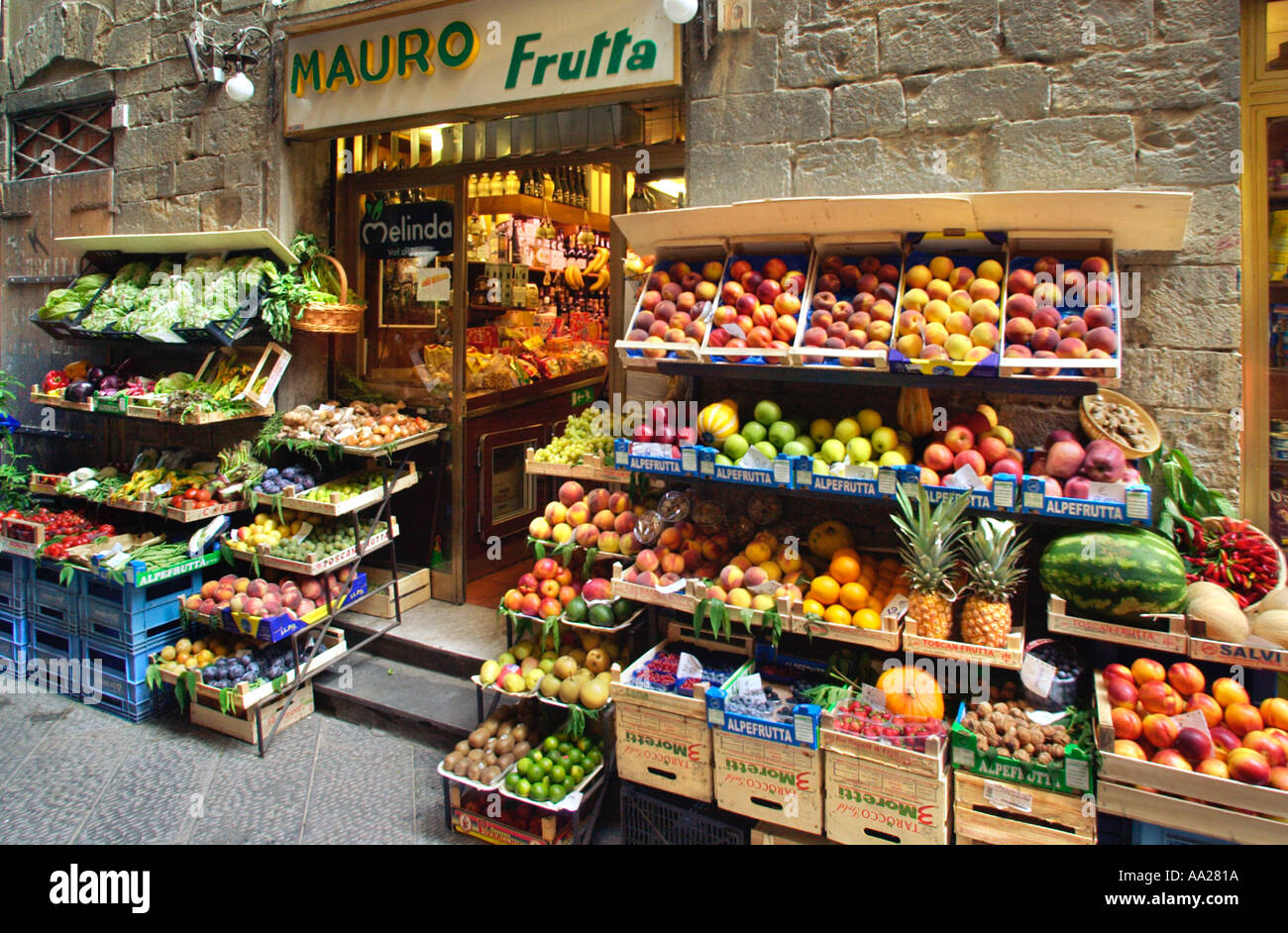 Traditional old shop selling fruit and vegetables in the historic city centre, Florence, Tuscany, Italy Stock Photo