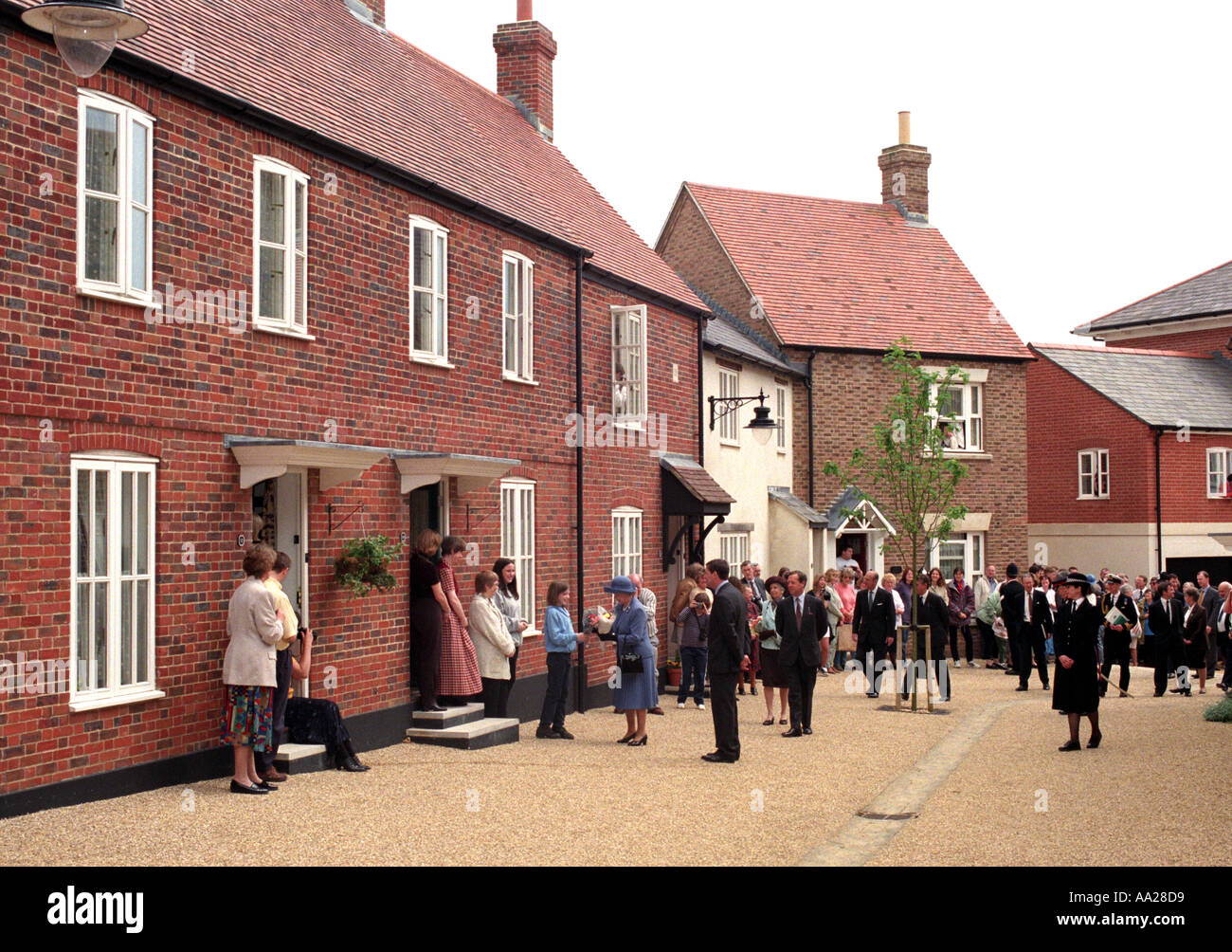 Queen Elizabeth II during a visit to her son s Poundbury Village project Stock Photo