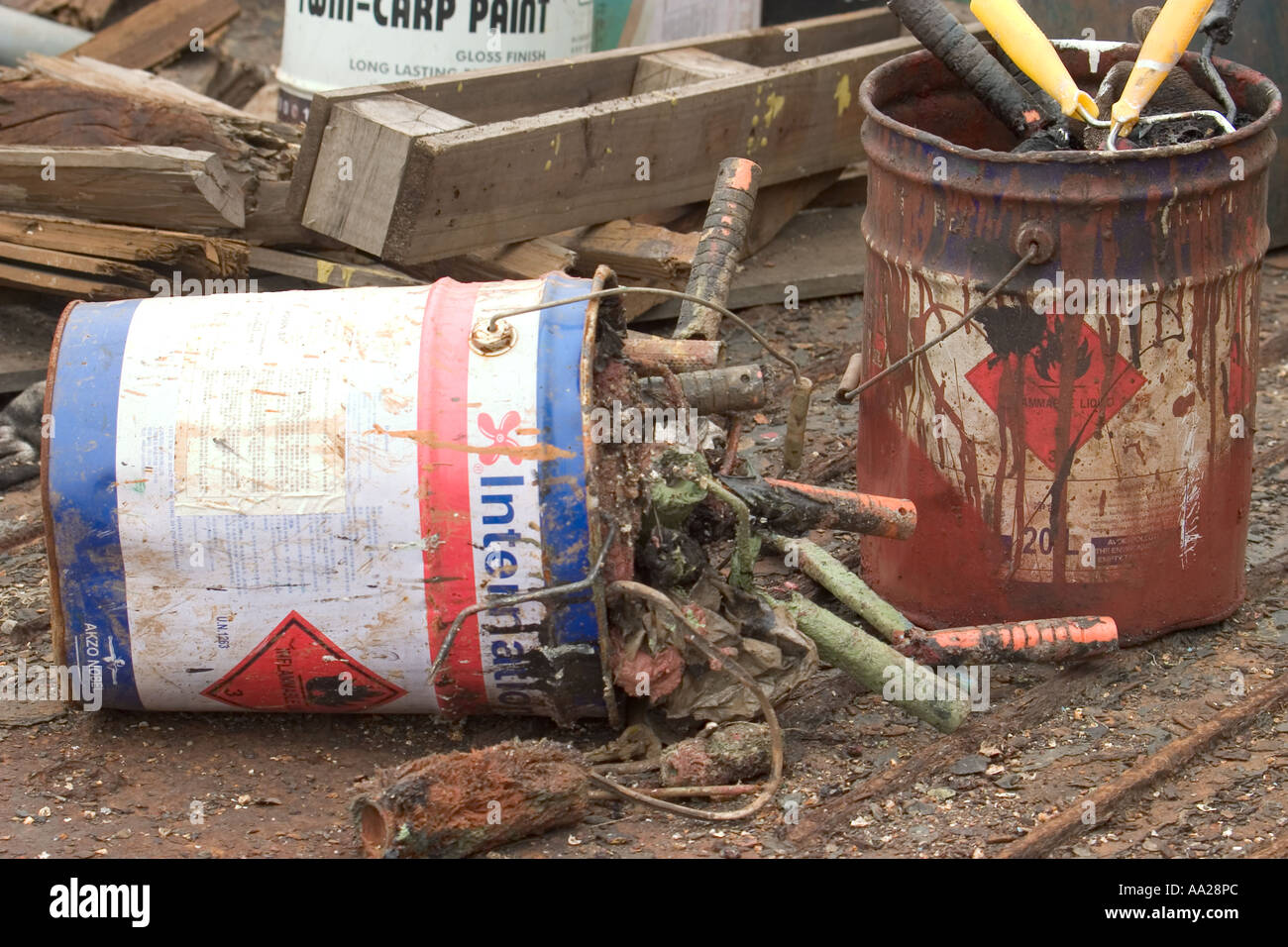 Dried Paint rollers and brushes in paint can Stock Photo Alamy