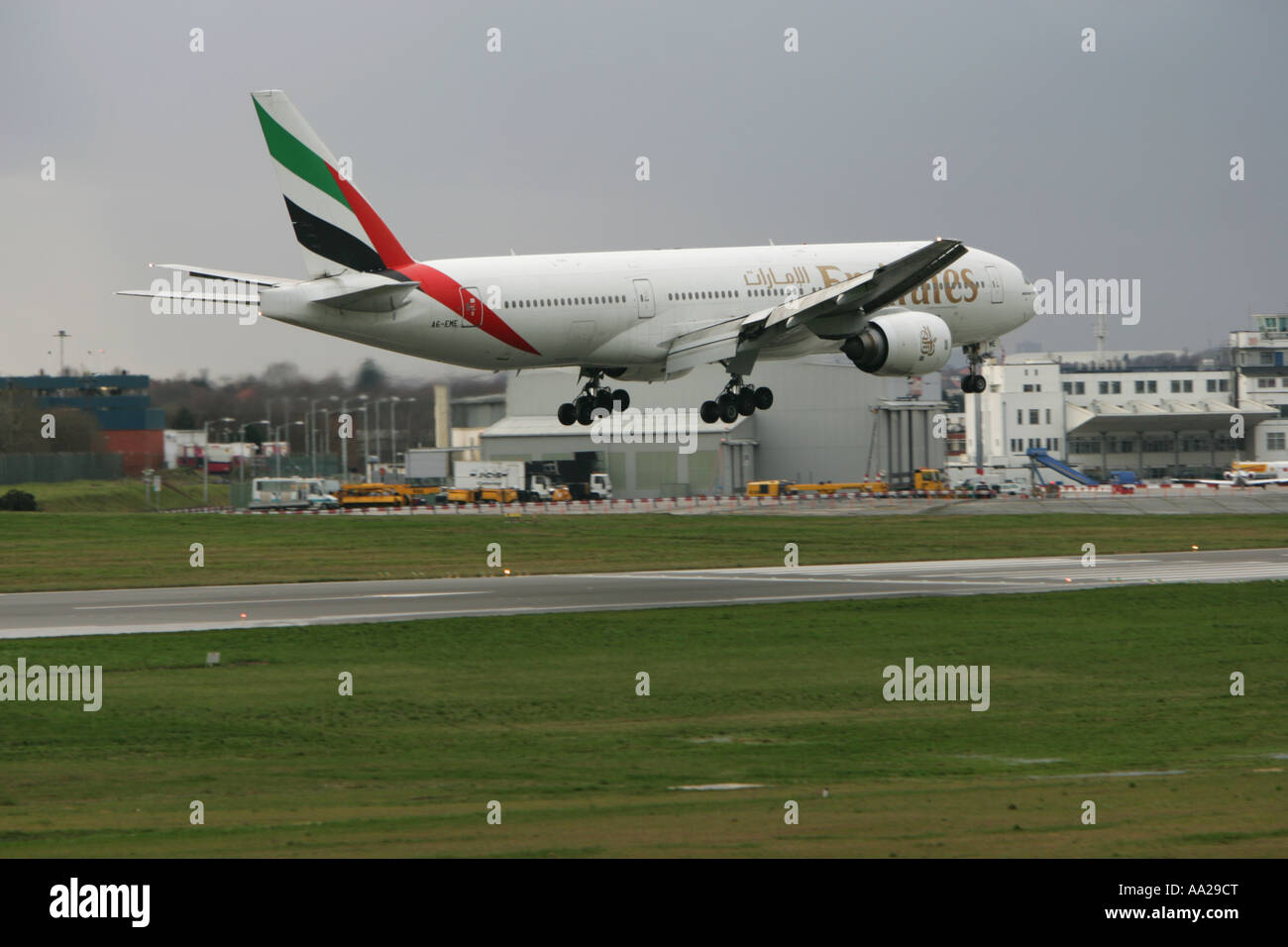 Emirates boeing 777 landing at Birmingham airport Stock Photo