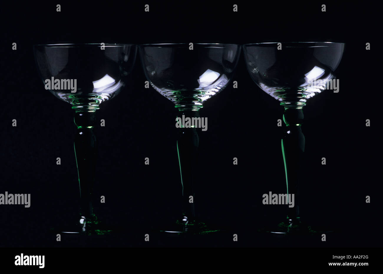 Three green stemmed glasses Stock Photo Alamy