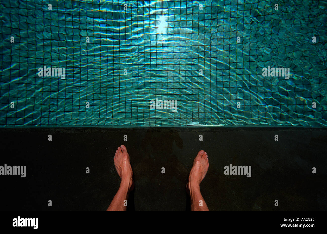 feet at swimming pool edge Stock Photo - Alamy