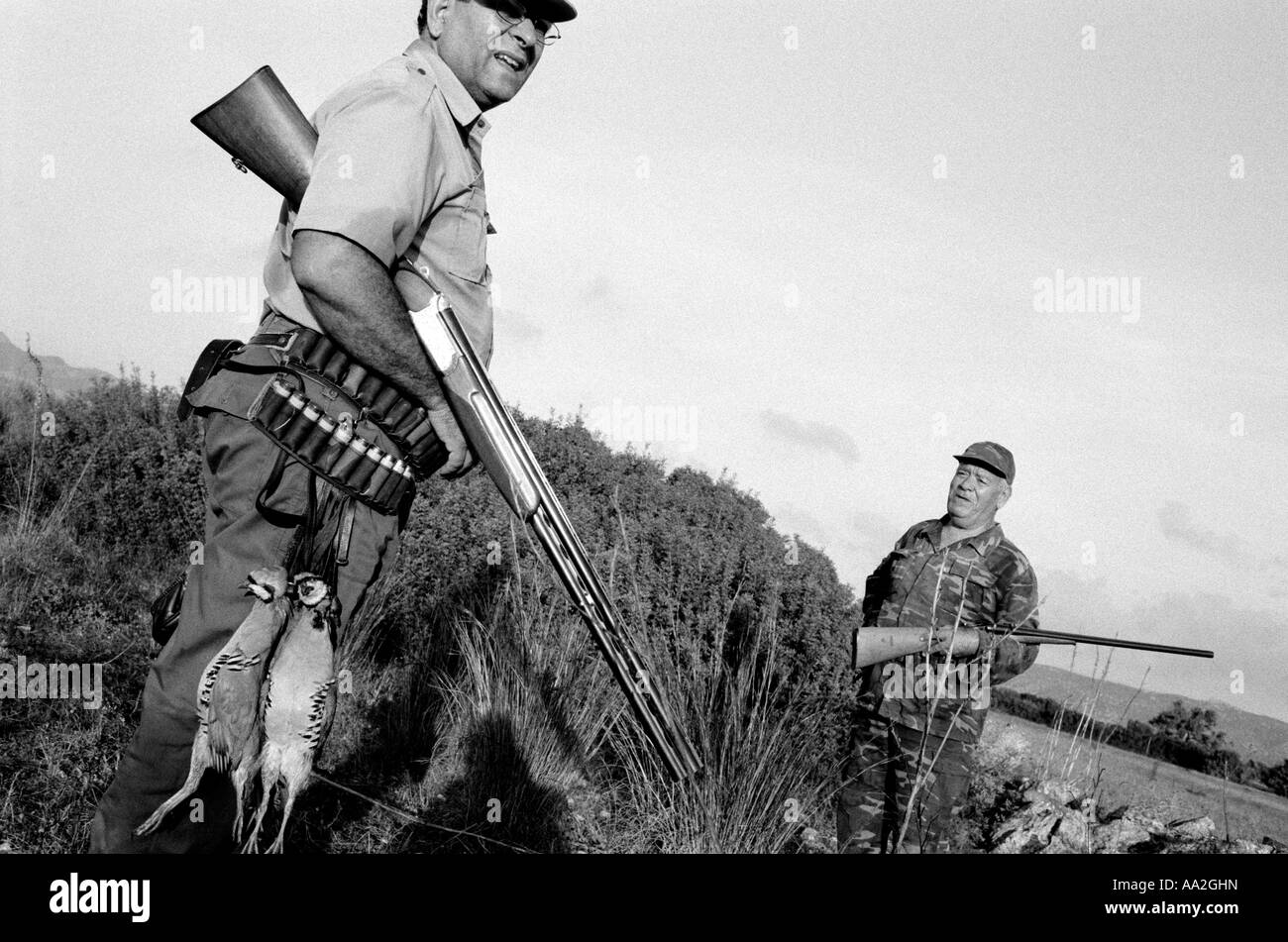 Men hunting partridge in Northern Cyprus Stock Photo