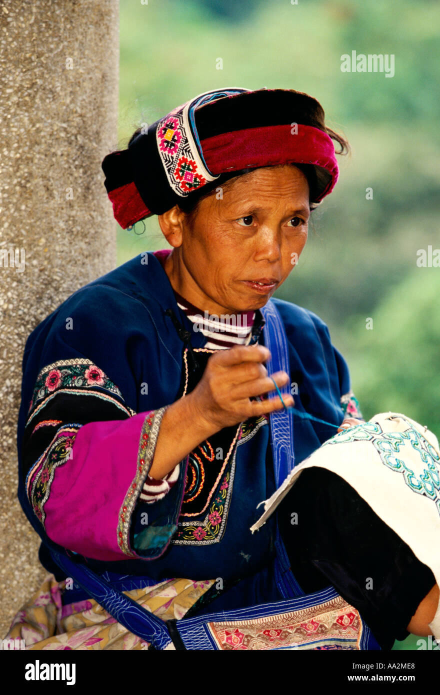 1, one, Chinese woman, Sani woman, Sani people, ethnic group, ethnic minority, Shilin Stone Forest, Stone Forest, Shilin, Yunnan Province, China, Asia Stock Photo