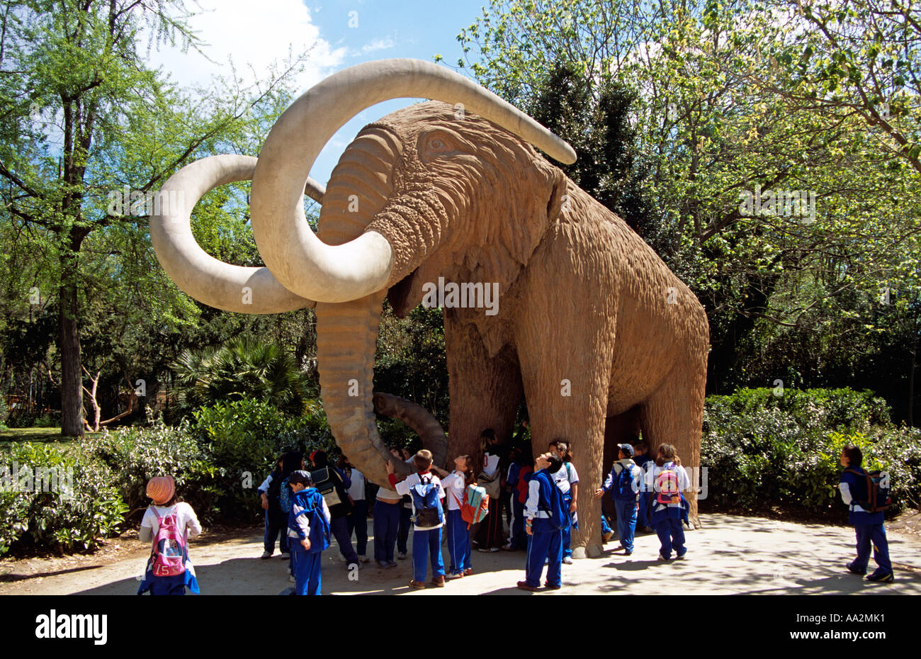 Mamut, Mammuthus Primigenius, and school children, Parc de la Ciutadella, Barcelona, Spain Stock Photo