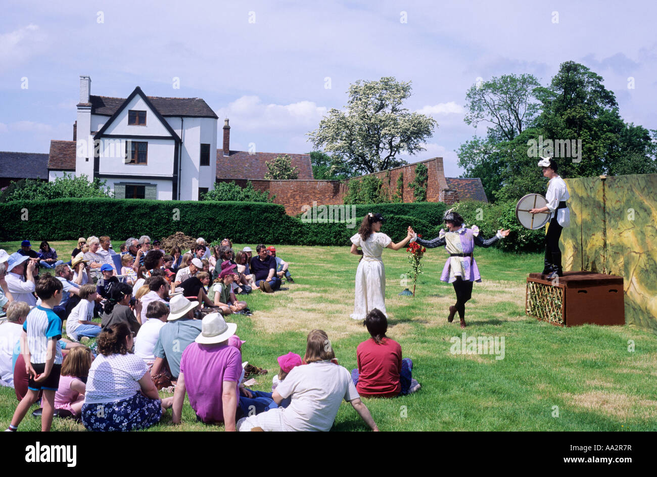 Open air theatre Shakespeare audience sitting on grass Actors Boscobel