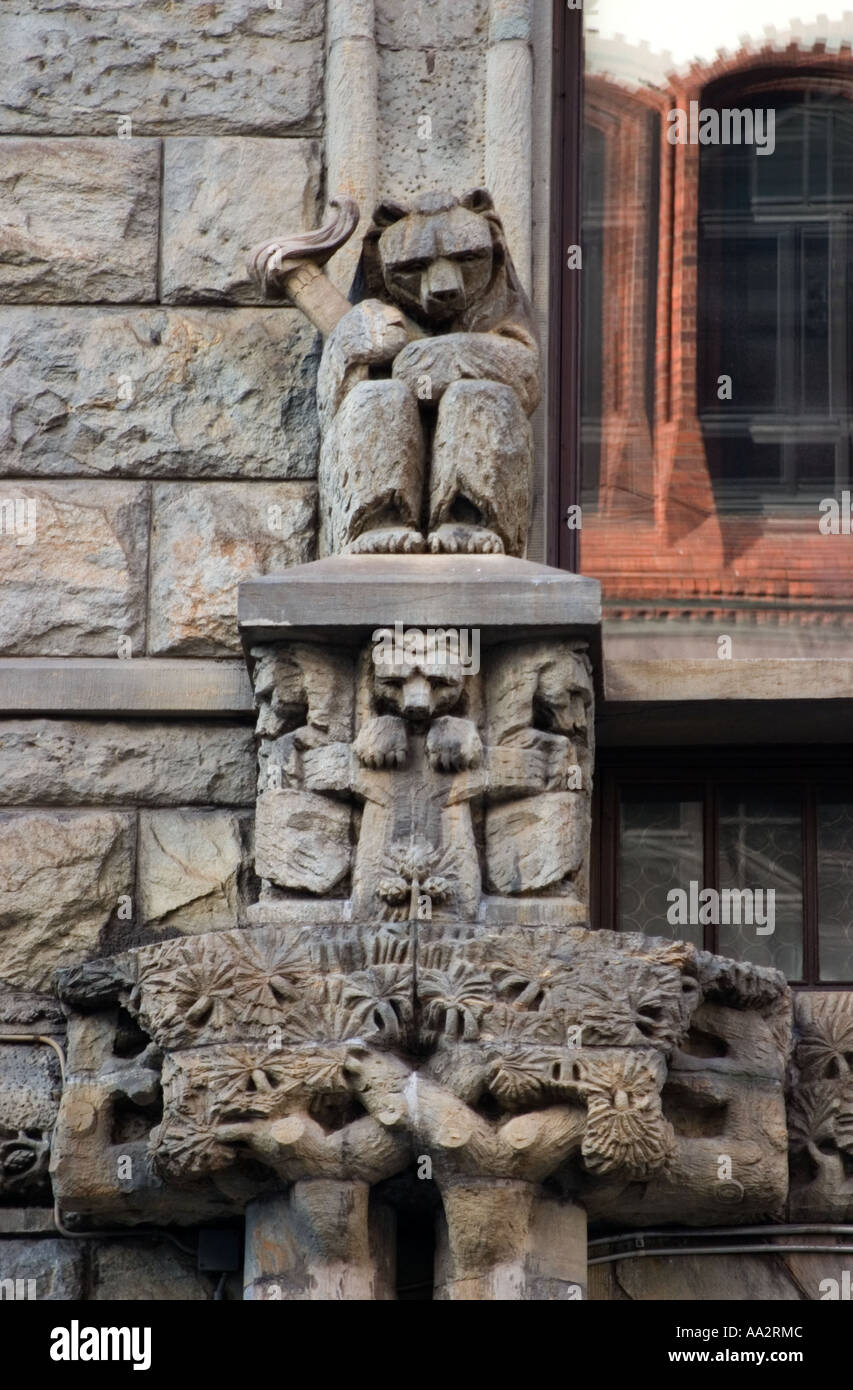 Detail from soapstone carvings of bears above main entrance to Pohjola Insurance Company building Helsinki Finland Stock Photo