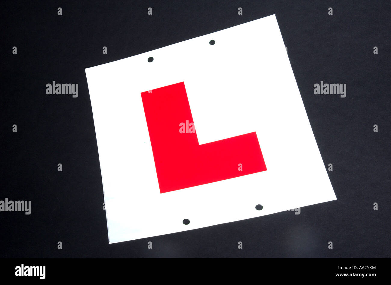 Learner L plate on black background Stock Photo