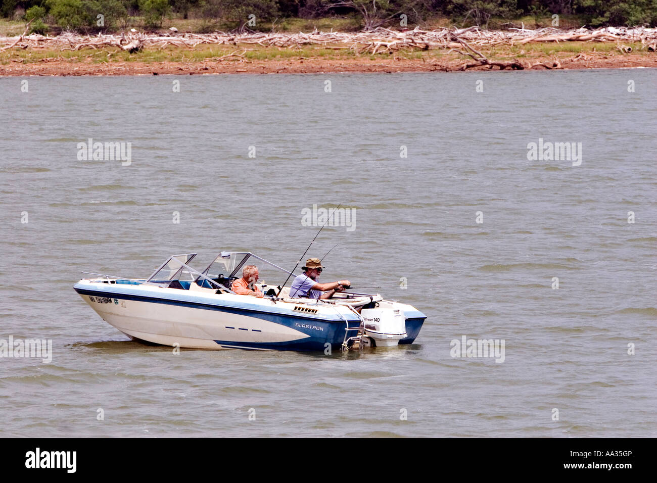 Two fishermen in a boat on Lake Buchanan Texas Stock Photo Alamy