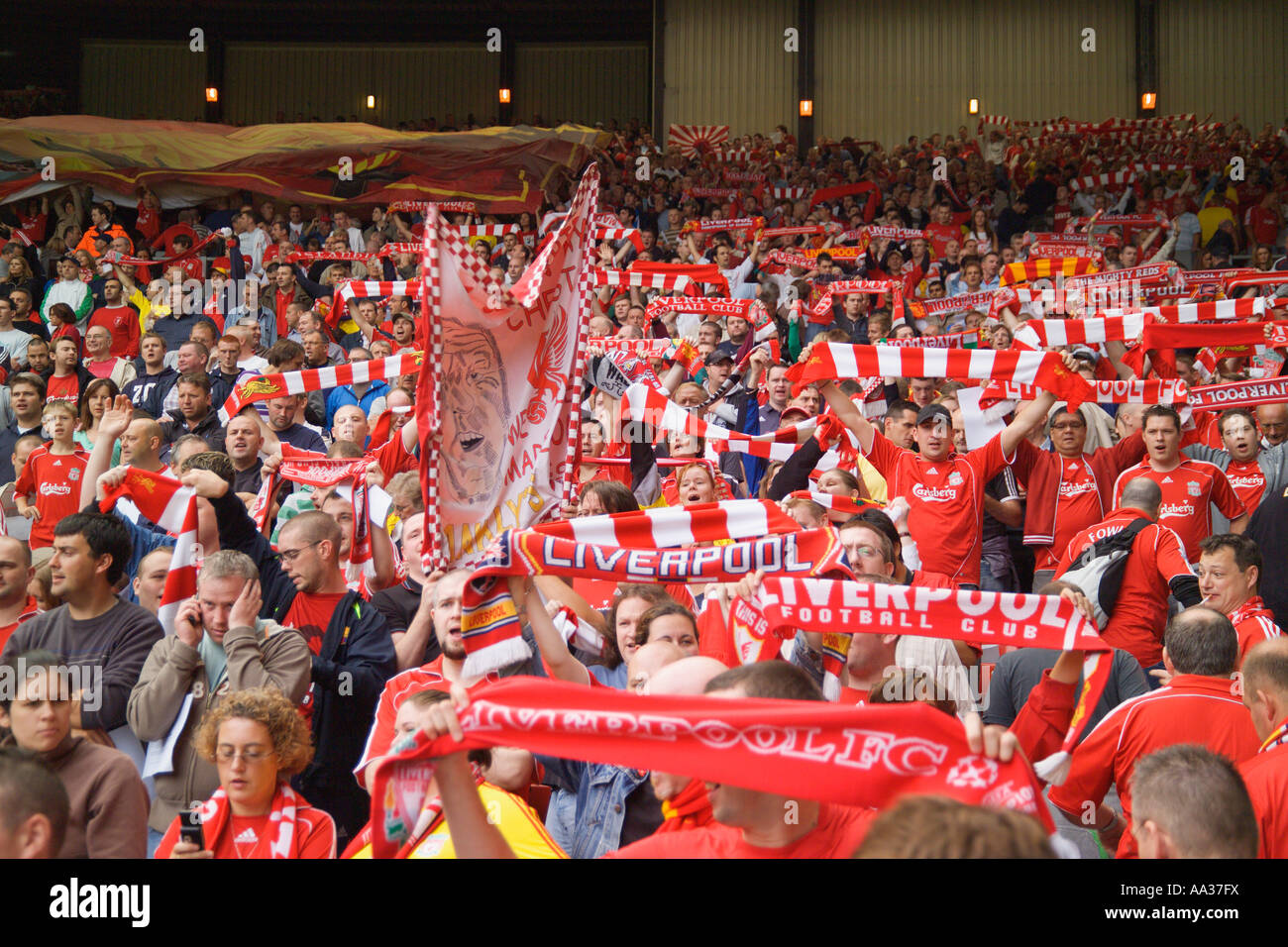 Crowd with scarves and banners Liverpool Football Club Merseyside England Stock Photo