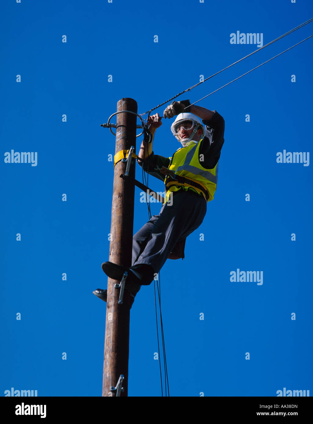 Engineer working on telephone line, England Stock Photo Alamy