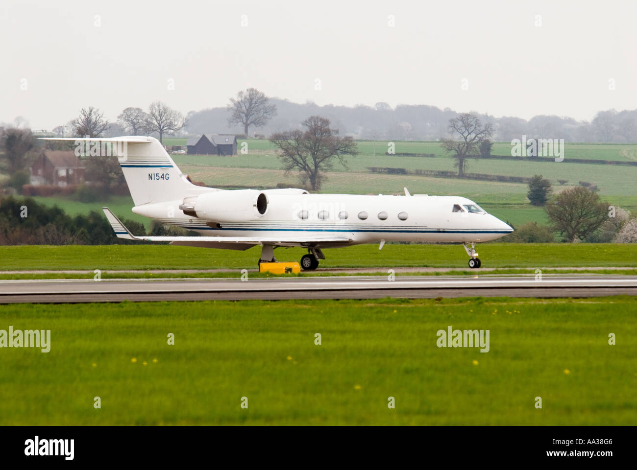 Private jet landing and taking off Stock Photo - Alamy