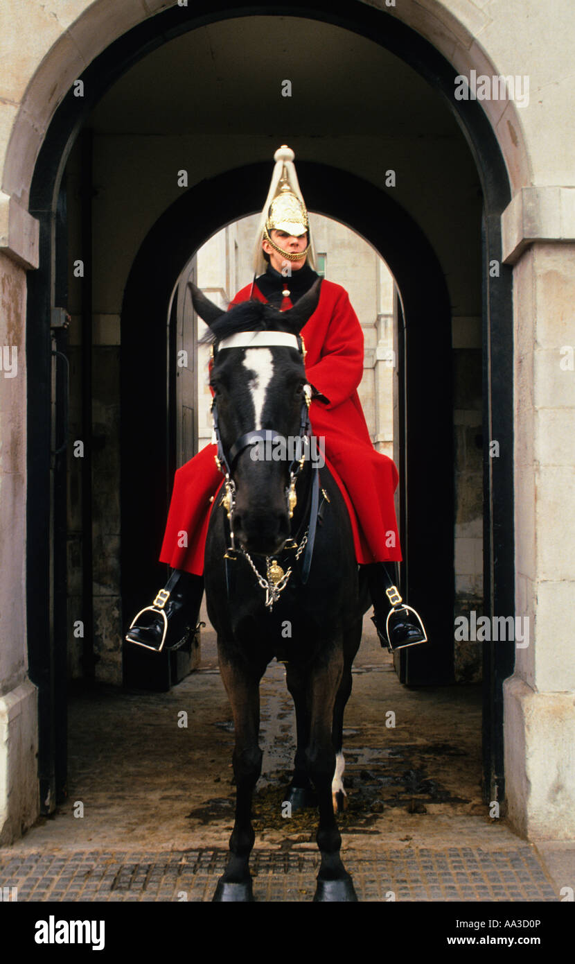 UK England Great Britain United Kingdom London Buckingham Palace The historic Queen's Guard or Grenadier Guard or Royal Guard on horseback Stock Photo