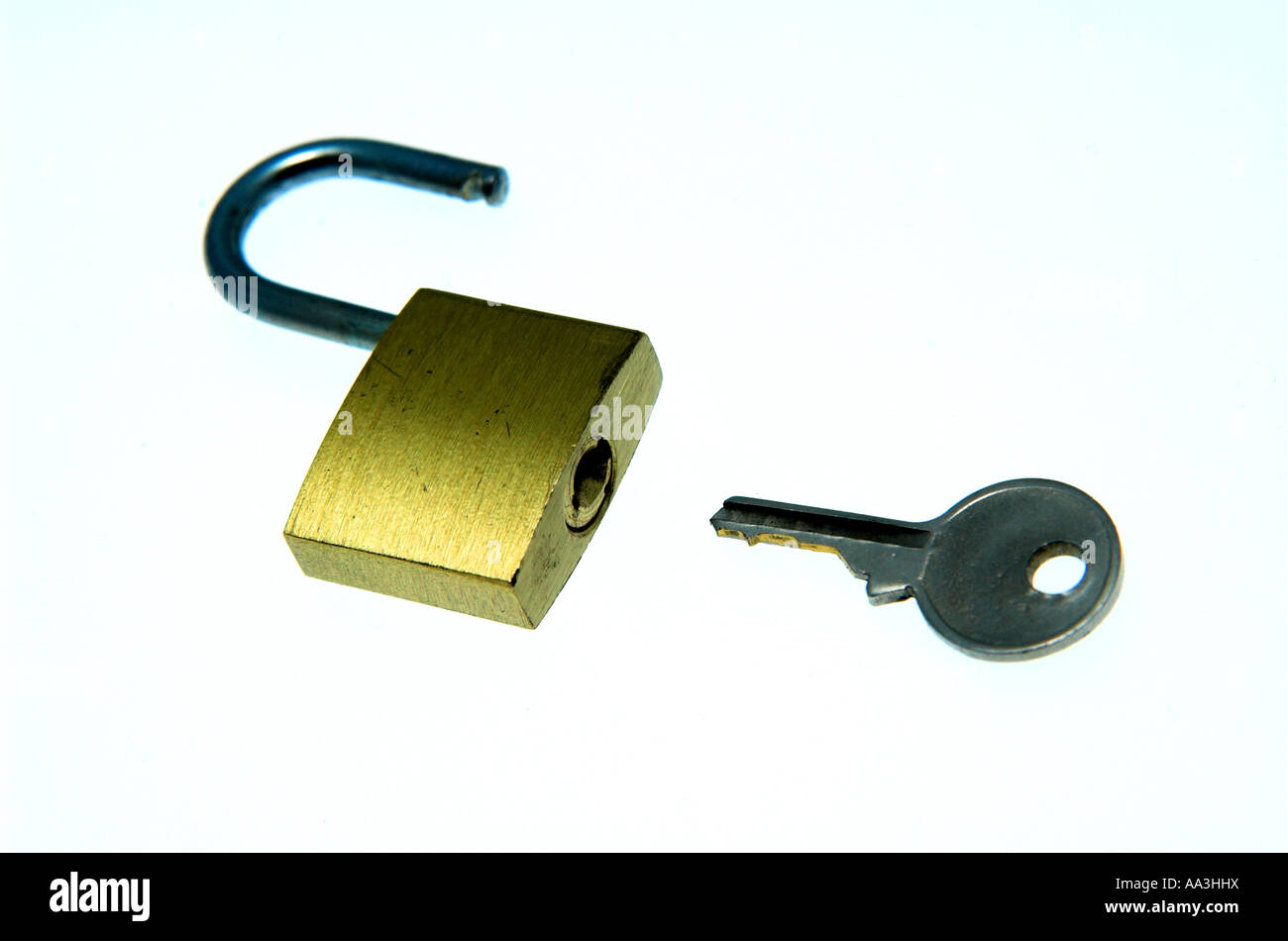 open padlock with key Stock Photo Alamy