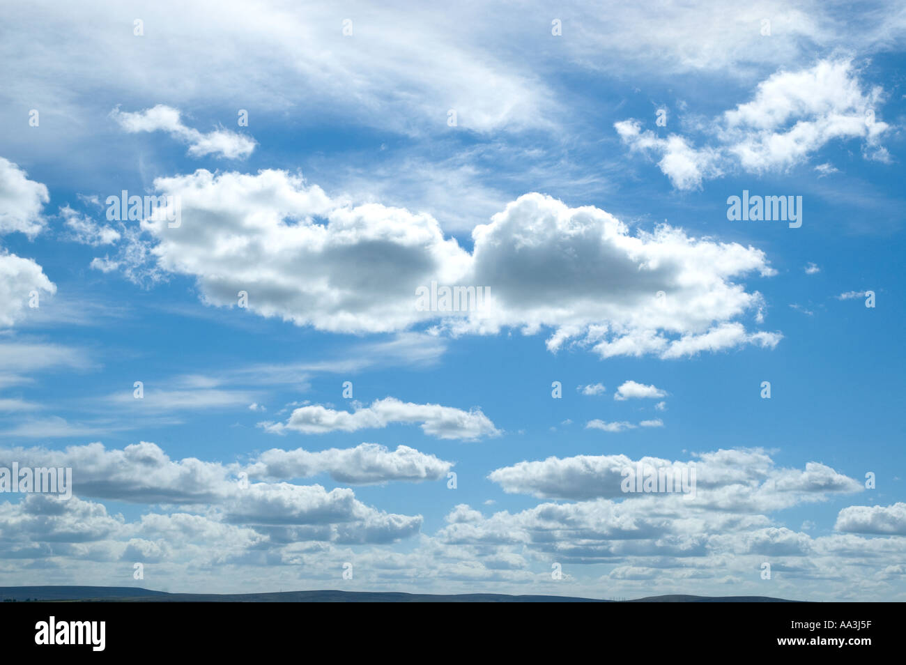 Blue sky with clouds Stock Photo - Alamy