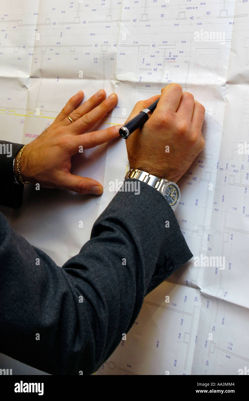 Working on blueprints Stock Photo