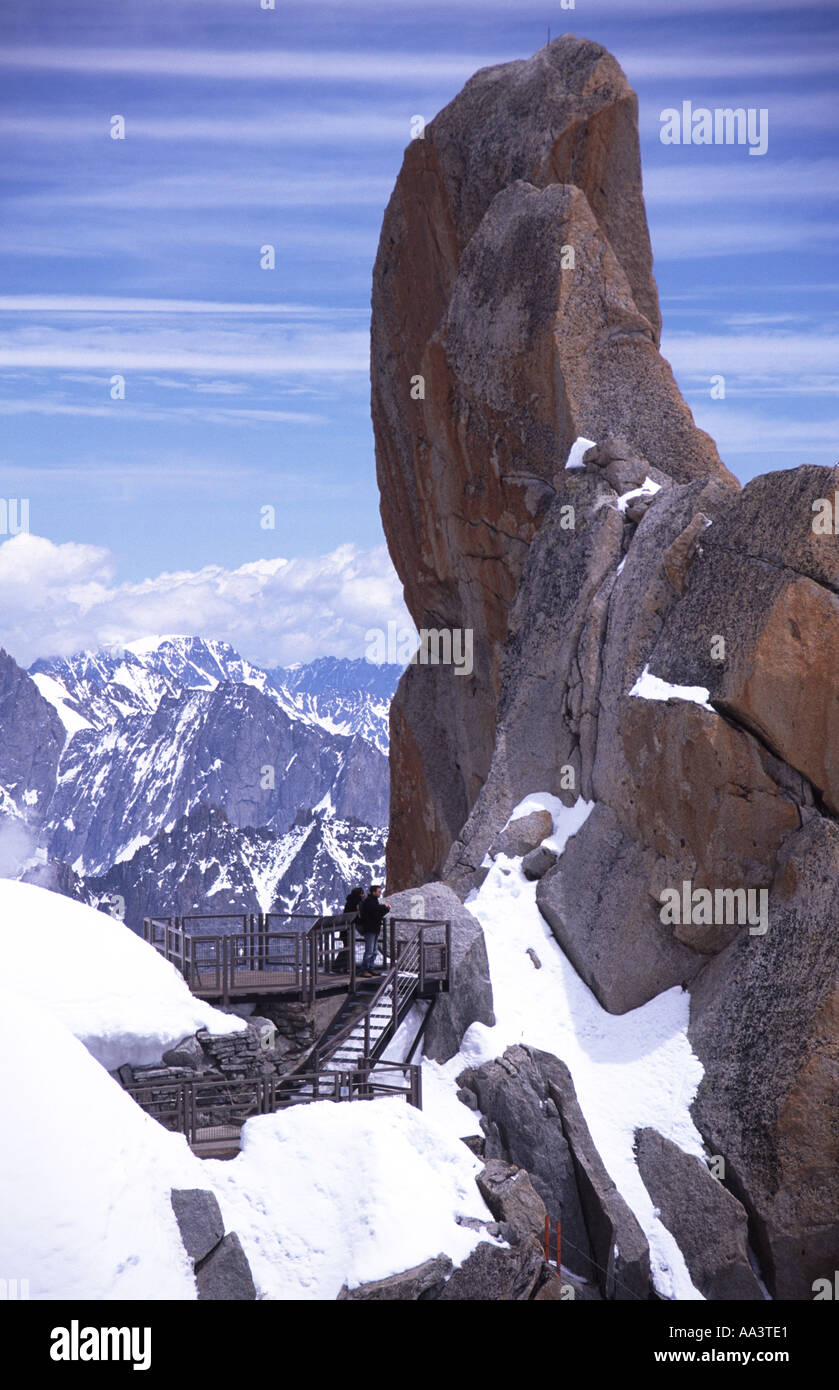 Viewing platform with tourists on the Aiguille du Midi in the Mont ...