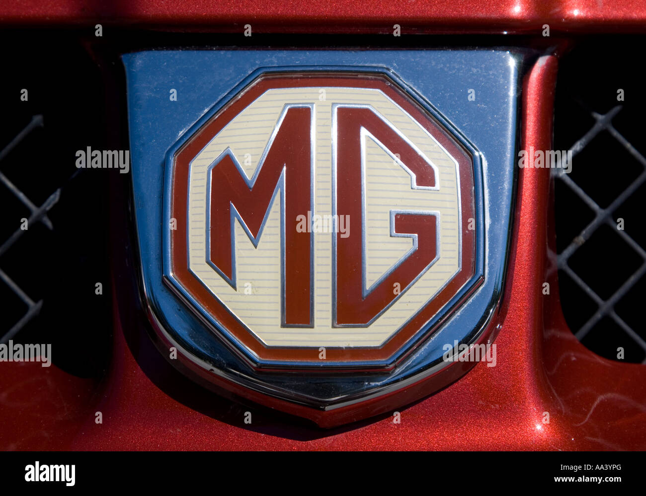 MG Logo Grille Badge – Black & Red With White Letters For MGB / MGB GT (1962-1970)