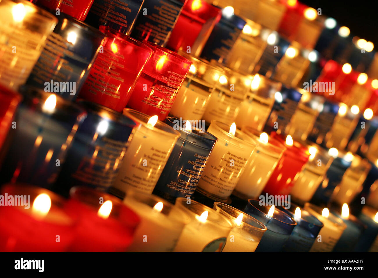 Lit coloured candle lines Stock Photo Alamy