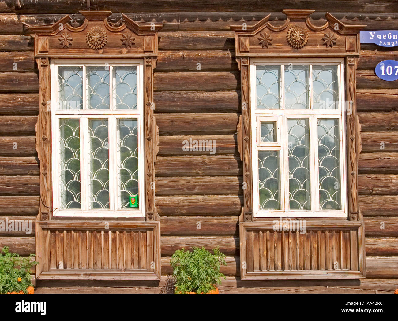Window of an old Sibirian wooden House, Windowframe from wood, Omsk, Sibiria, Russia, GUS, Europe, Stock Photo