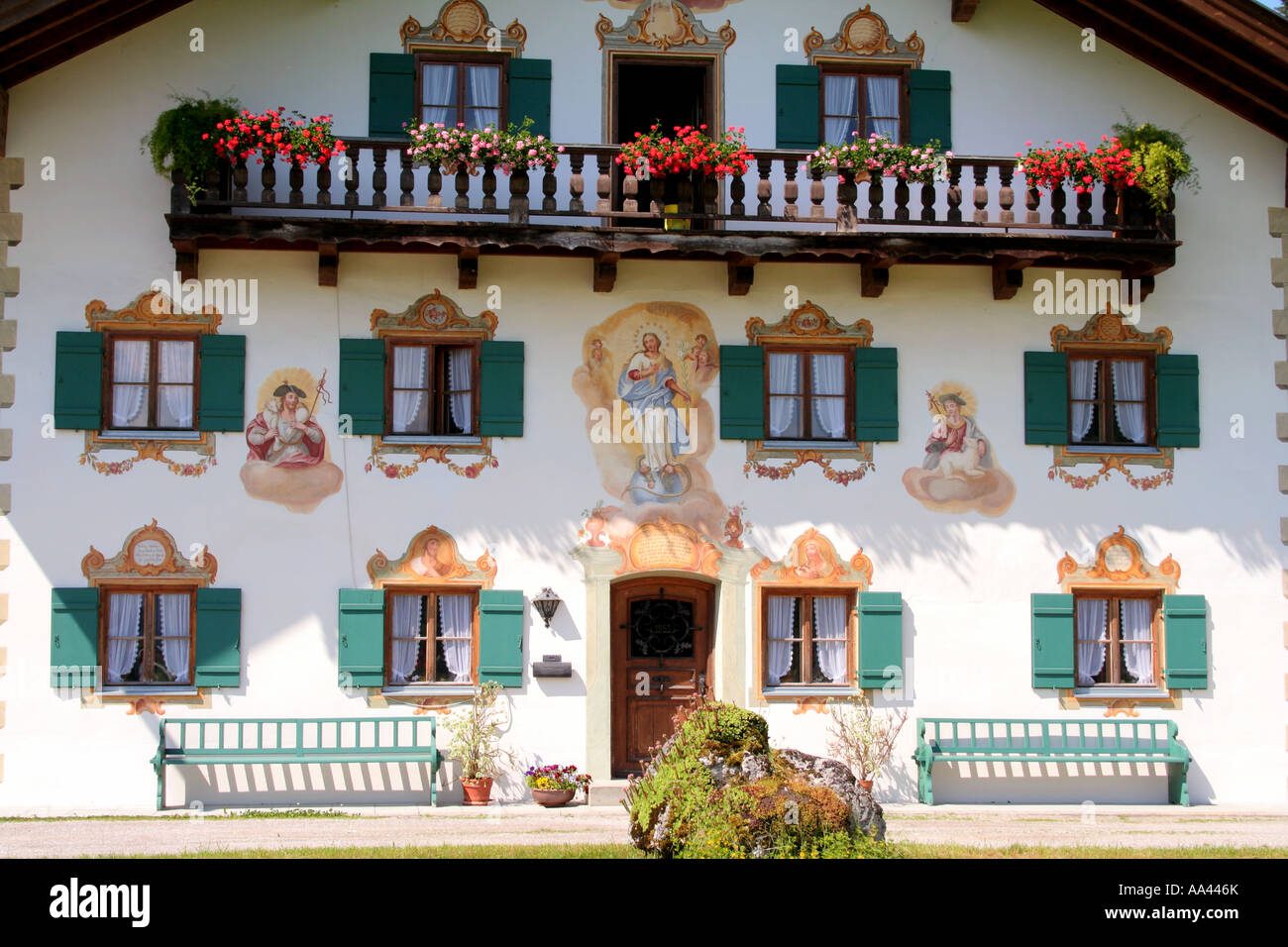Traditional Bavarian farm house with painted facade Bavaria Germany