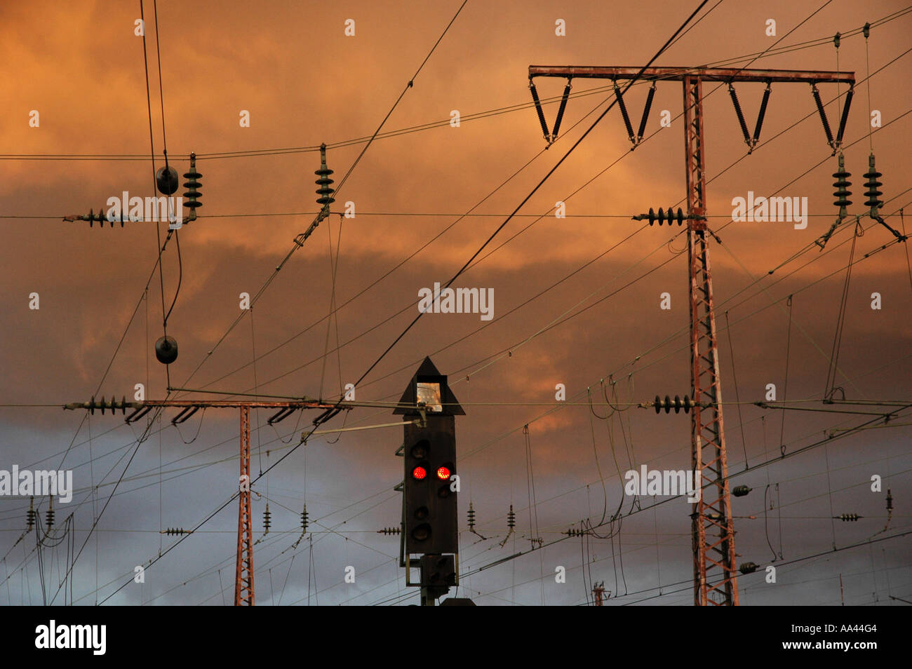 ||power supply lines in front of a sky with sunset Stock Photo - Alamy