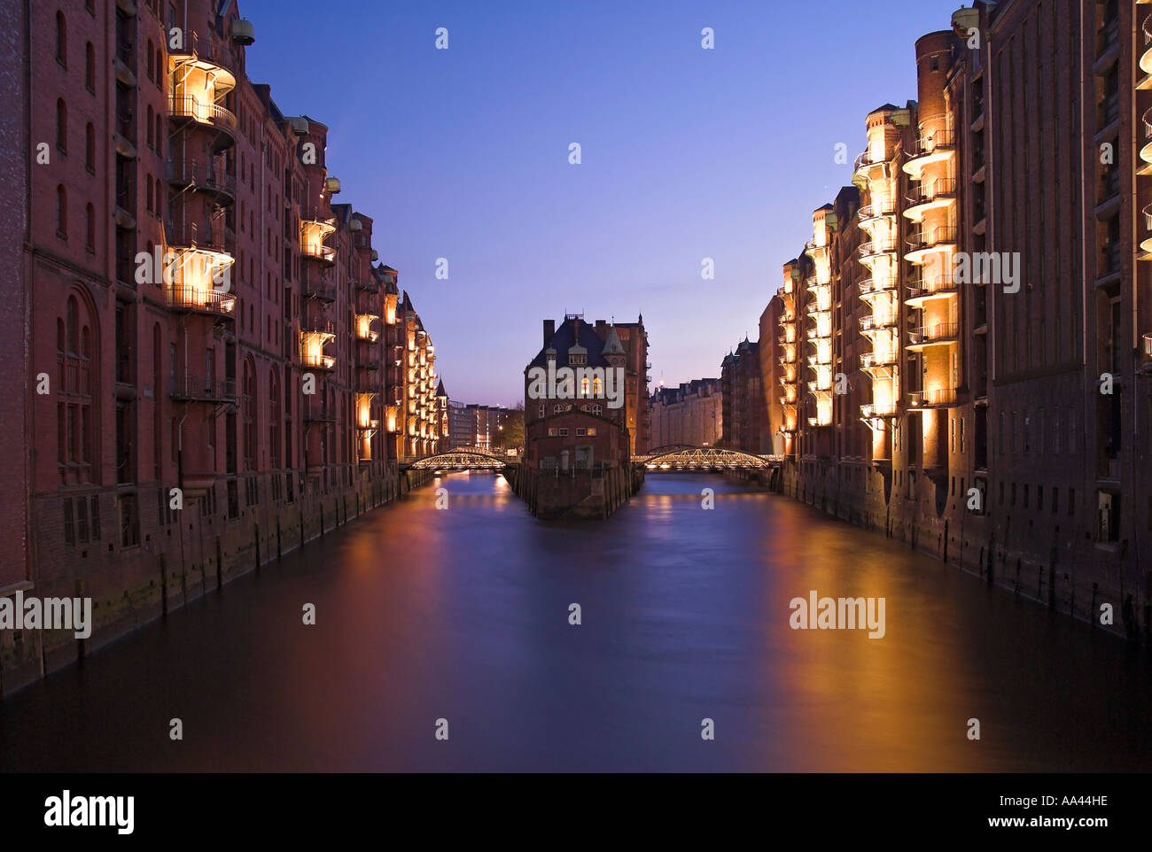 Wasserschloss, Water Castle in the old warehouse district Speicherstadt in Hamburg at night, Germany Stock Photo