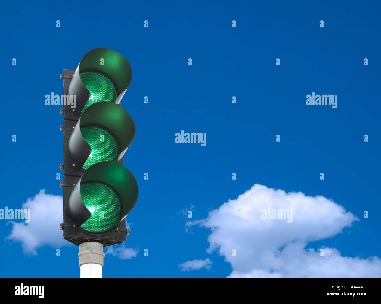 Three green traffic lights Stock Photo