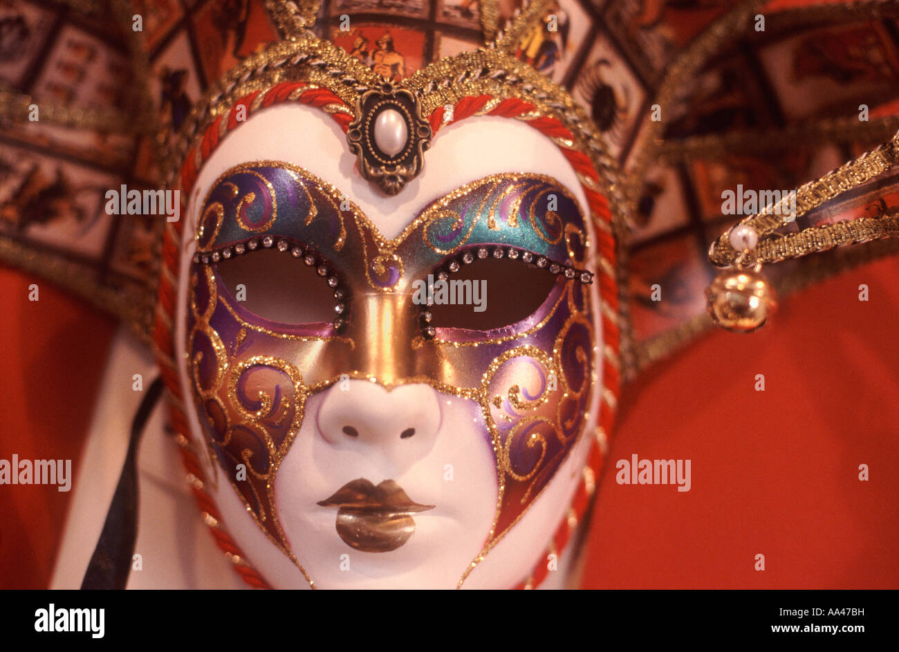 Venice carnival mask set with gold and red braid, pearls and glittering