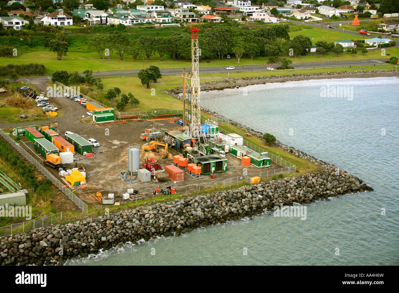 An oil drilling rig works on the waterfront at New Plymouth New Zealand