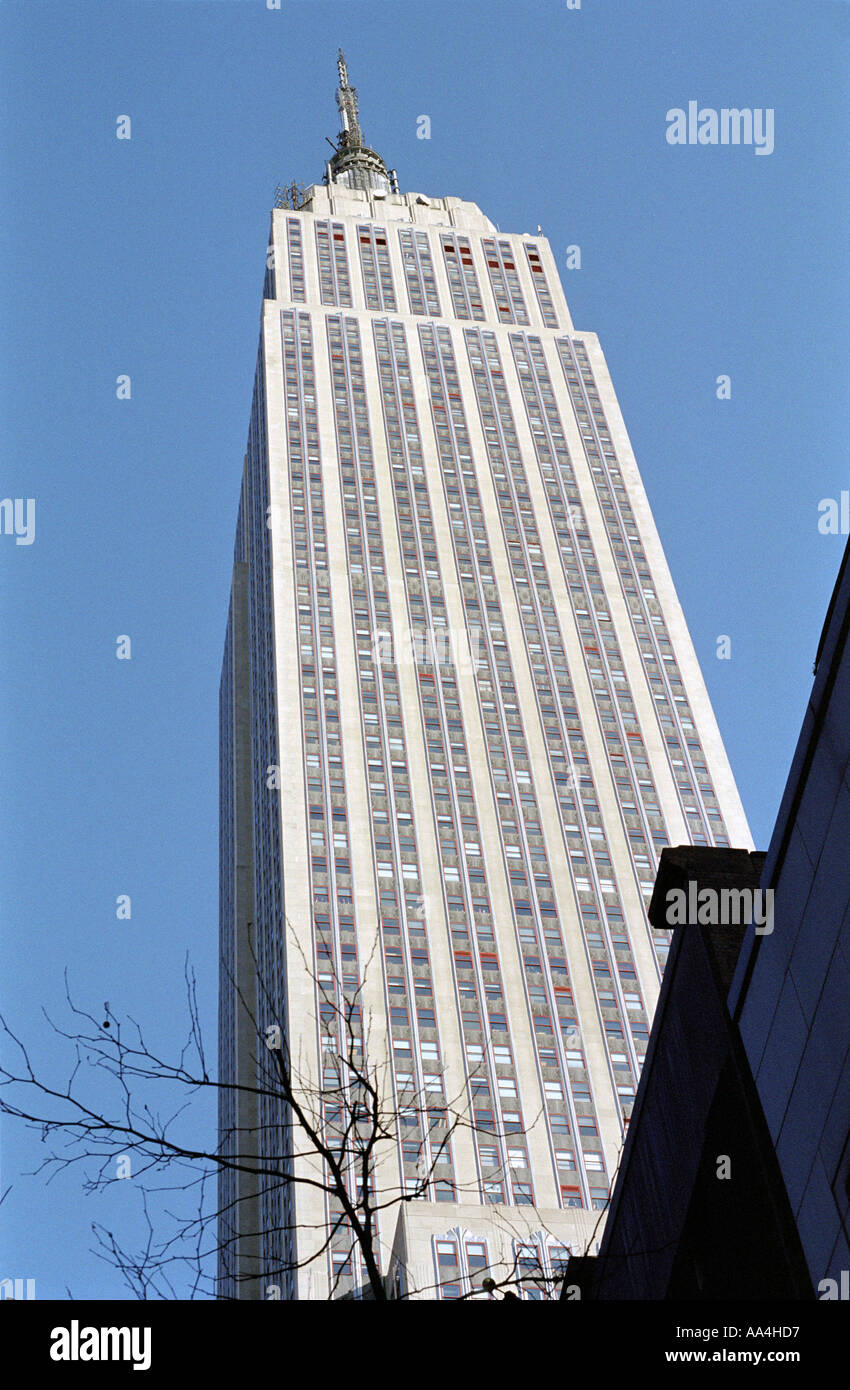 Unusual view of the Empire State Building against the background of a bright blue sky Stock Photo