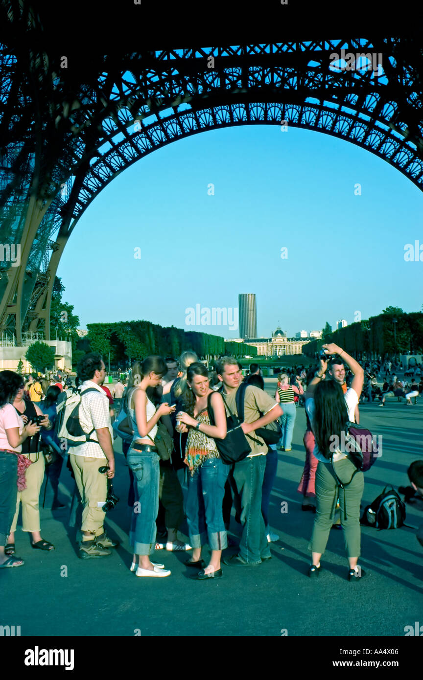 Paris France, French Monuments, Medium Crowd People,  Young Adult Tourists Waiting on Line Eiffel Tower, on Vacation, young woman in a crowd Stock Photo