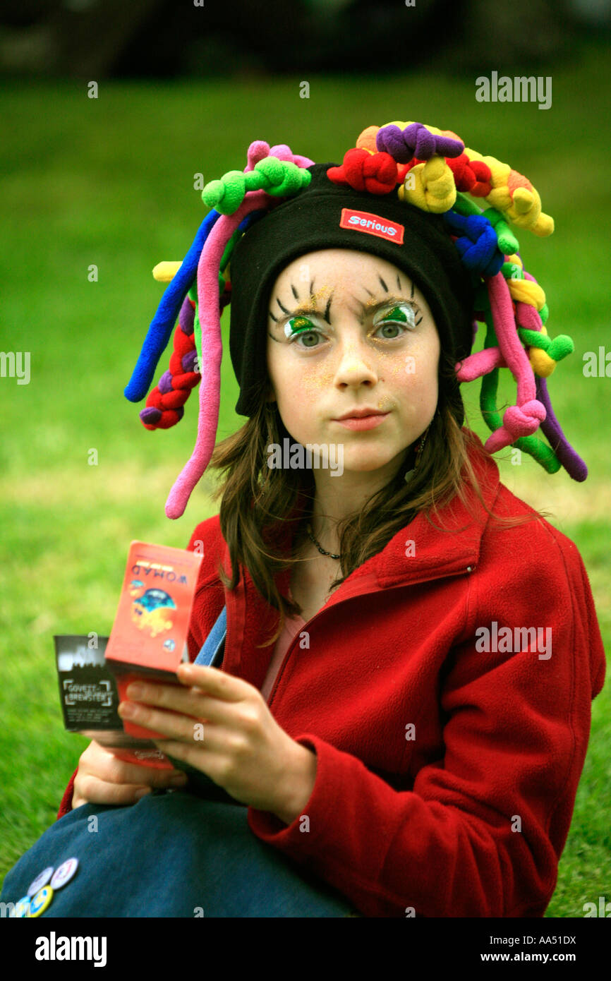 A beautiful young girl with painted face at music festival in New Zealand Stock Photo