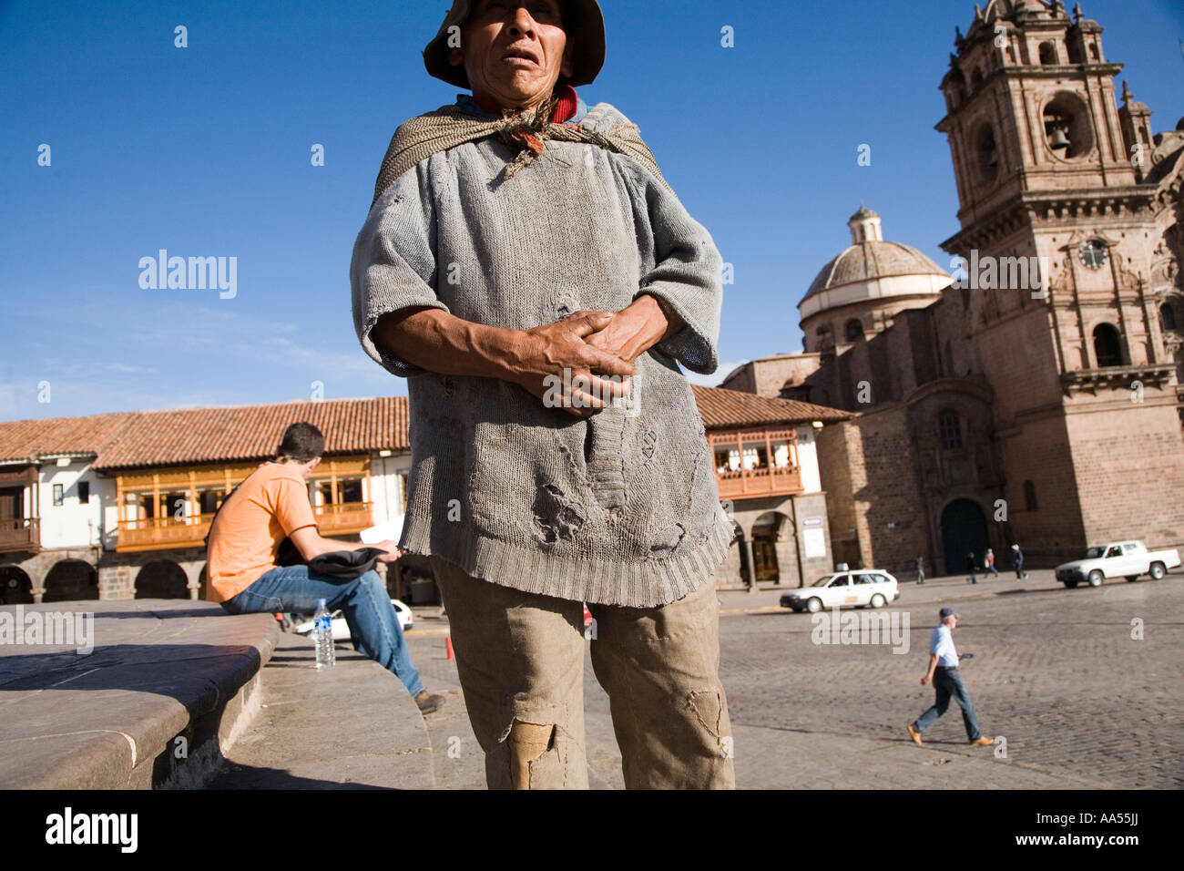 Beggar in the plaza in Cuzco, Peru Stock Photo