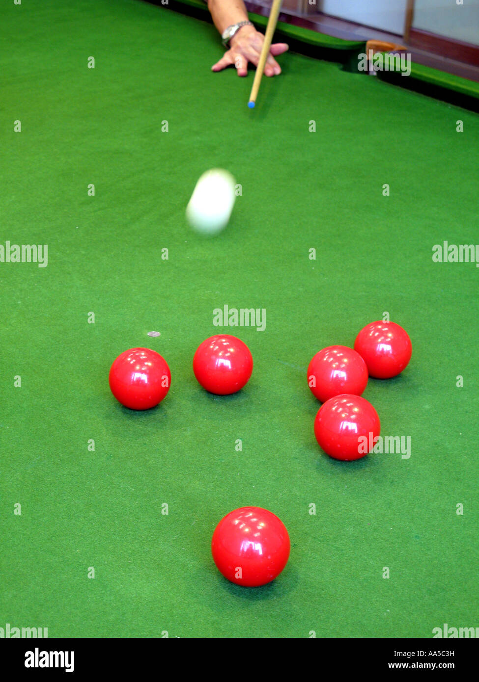 Player target at the red ball on a snooker table Stock Photo Alamy