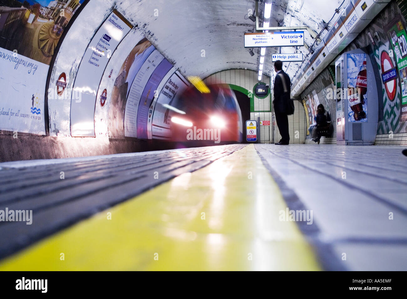 London Underground Train approaching the Station Stock Photo