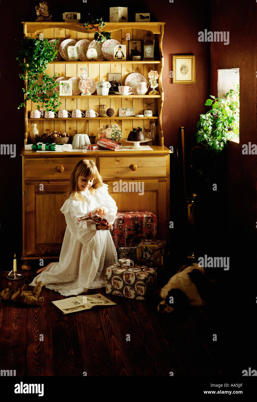 Victorian Christmas kitchen scene with child Stock Photo