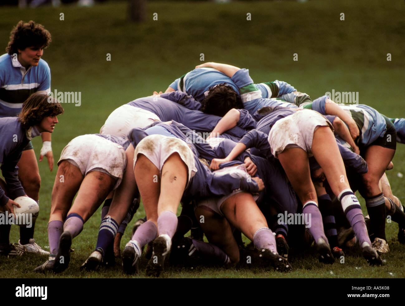 Women s rugby scrum at the moment of a throw in Stock Photo