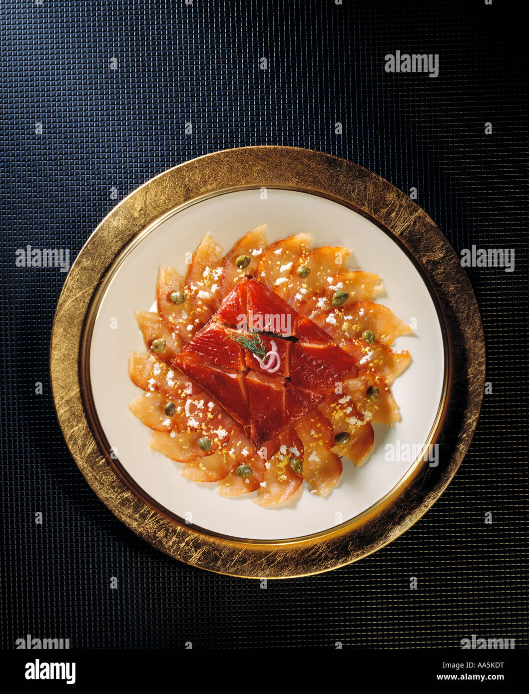 elegant gold rim plated dinner plate salmon entree culinary Stock Photo