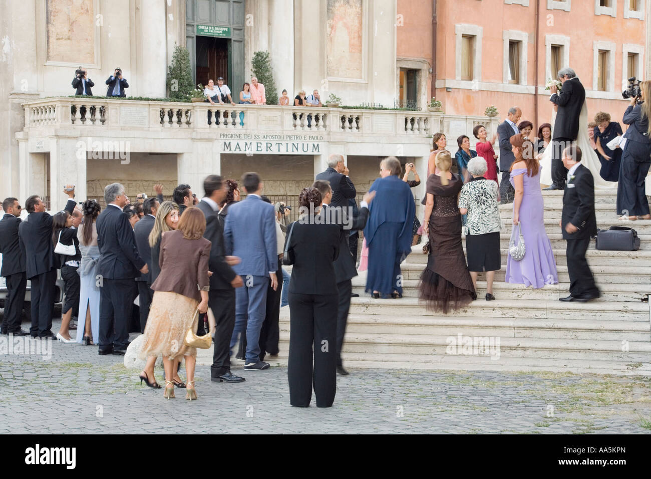 Italy, Rome. Newlyweds outside church on Via dei Curia besides the Roman Forum Stock Photo