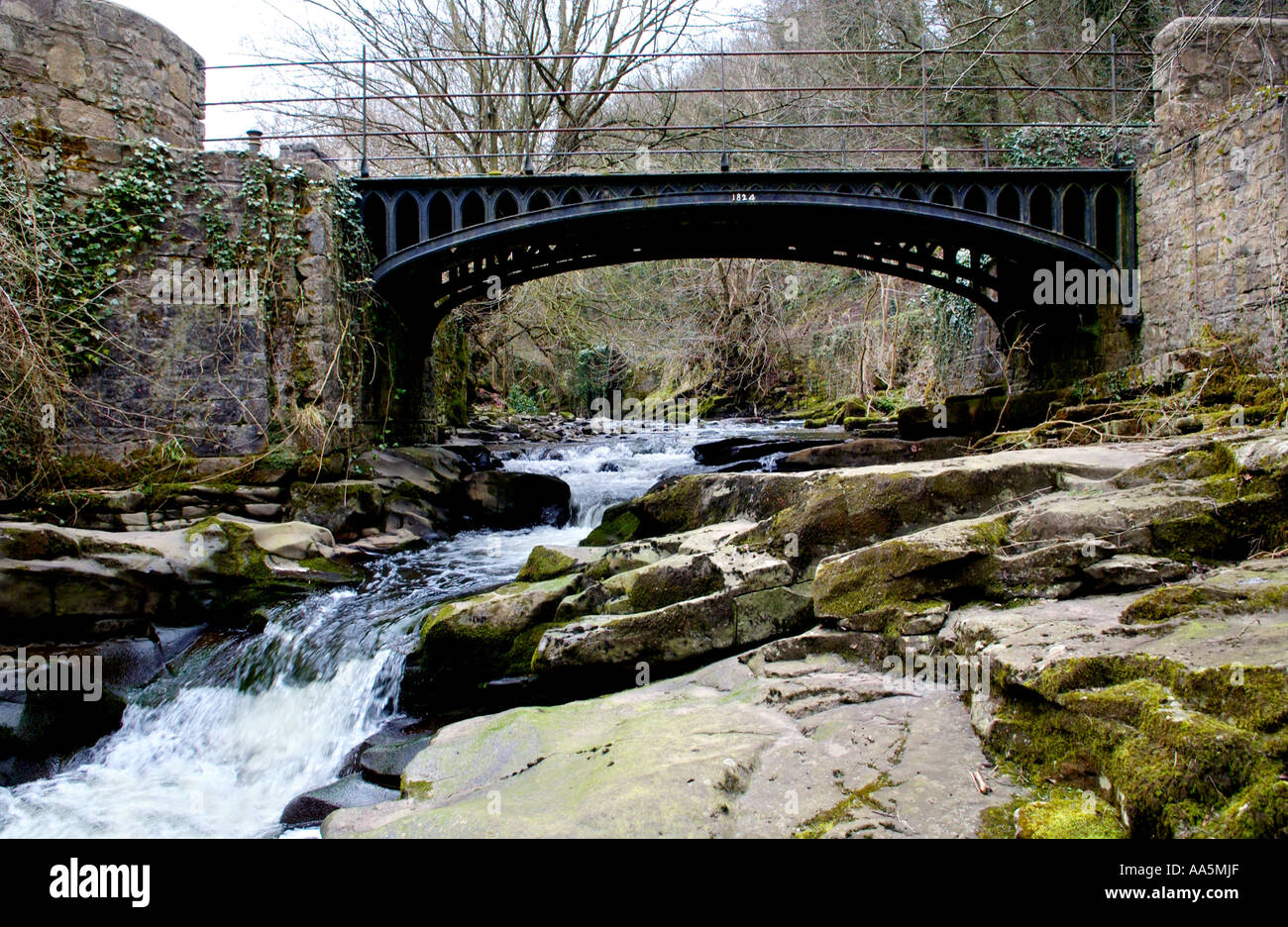 Cast iron bridge dated 1824 over river to Clydach Ironworks established