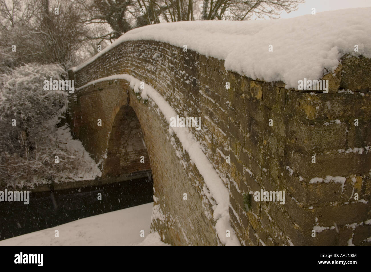 Snowy Bridge in Buckinghamshire over the grand union canal near puttenham Stock Photo