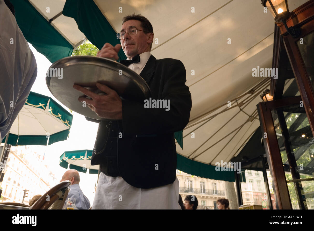 Waiter at Cafe Les Deux Magots, St Germain des Pres, Paris, France Stock Photo