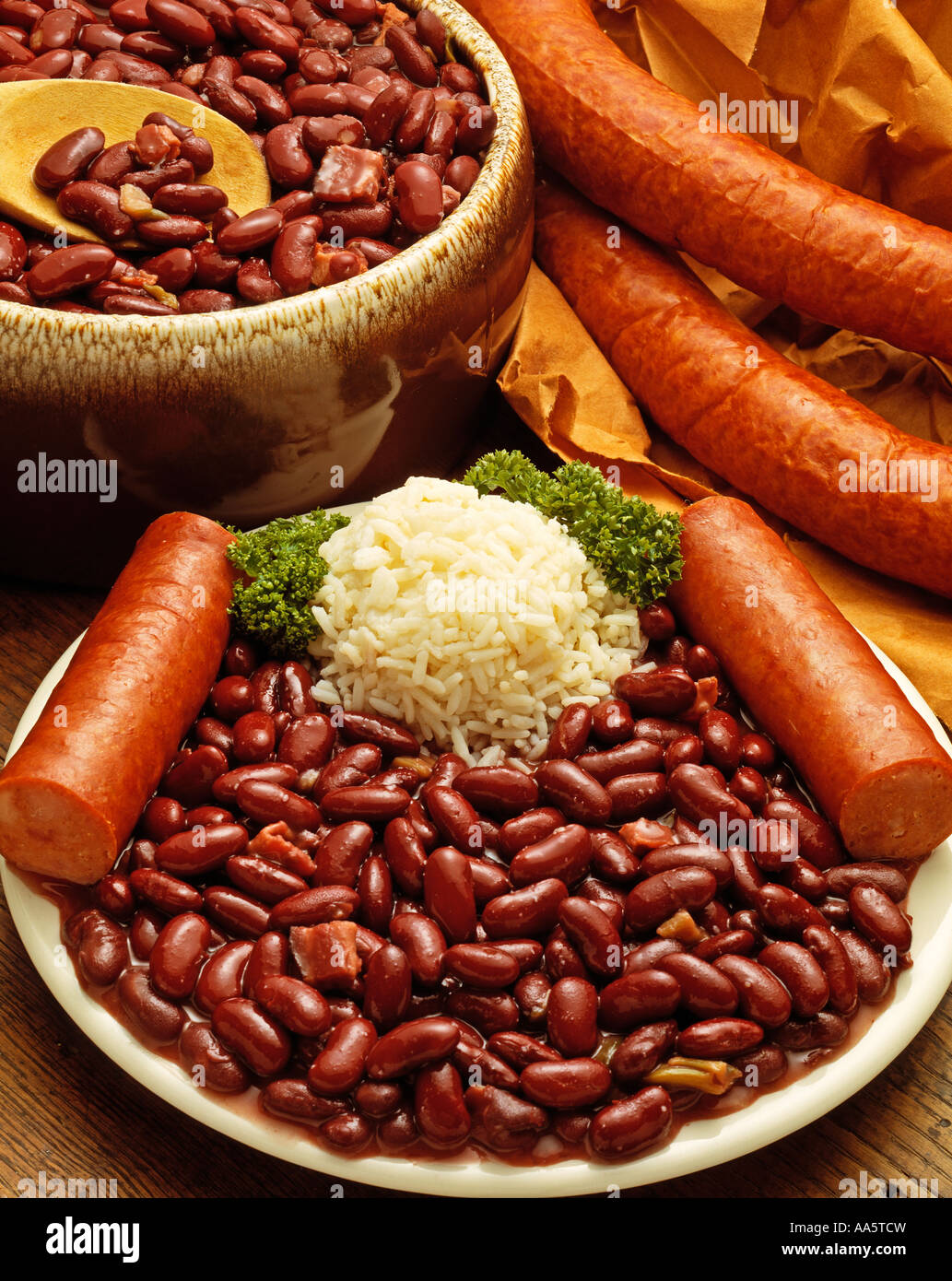 chili kidney beans sausage rice plate brown kraft wrapping paper bowl culinary ethnic Stock