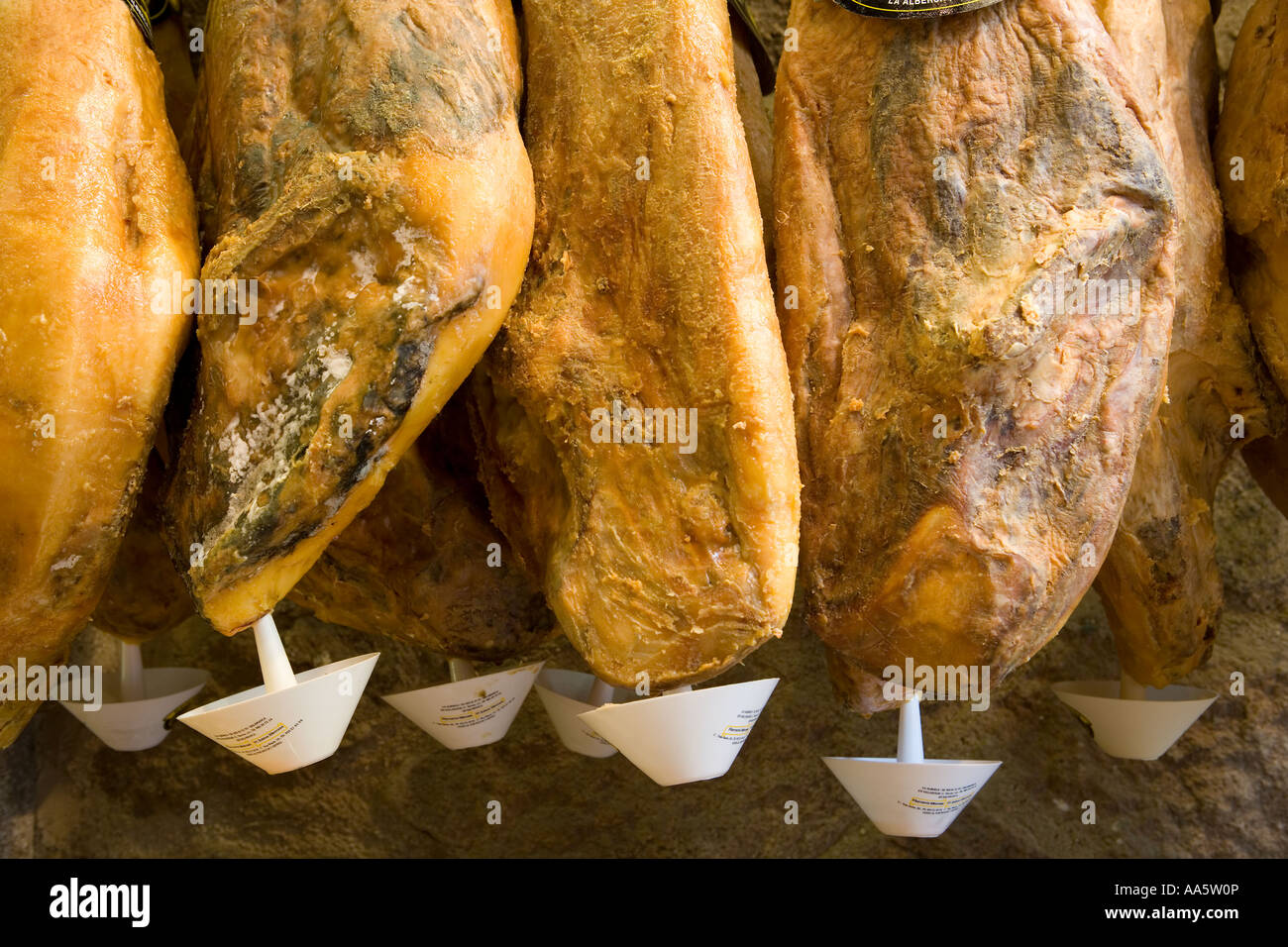 Drying hams (Serrano ham),  Salamanca Castile Spain Stock Photo